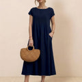 Capped-sleeve, Voluminous Pleated Midi Dress
